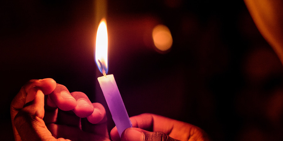 person holding candle