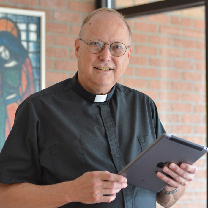 priest smiling