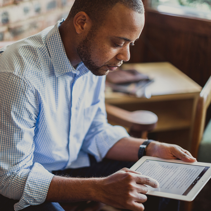 man using ipad