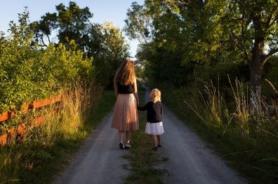 mother and daughter walking