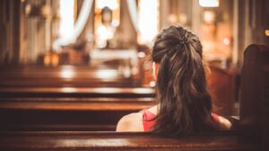woman sitting in church
