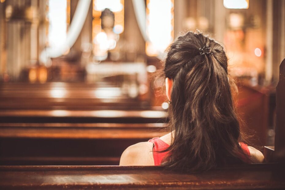 woman sitting in church