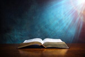 opened bible on table