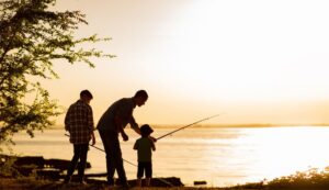 father and sons fishing
