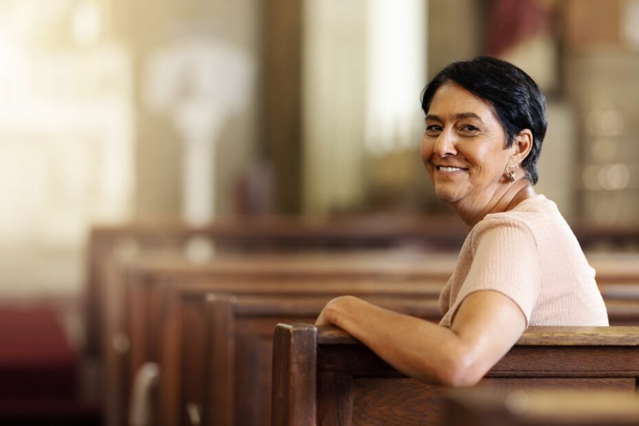 elderly hispanic woman in church