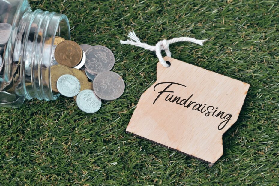 fundraising sign with coin jar