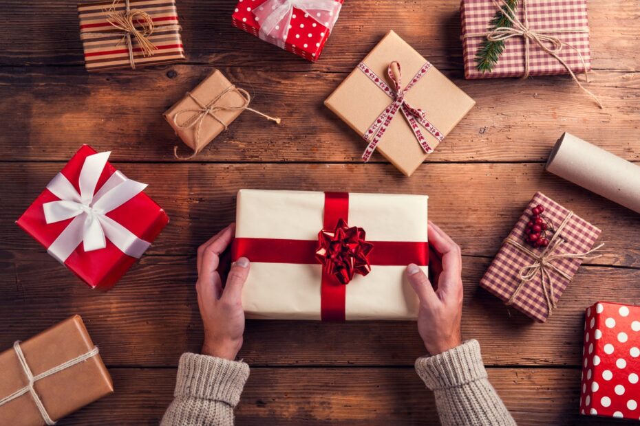 woman holding christmas gifts