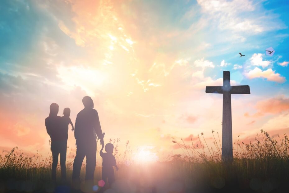 family looking up at cross