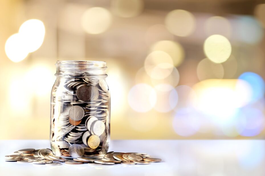 money jar filled with coins